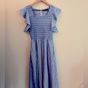 Pretty blue striped dress with ruffle sleeves and pockets!